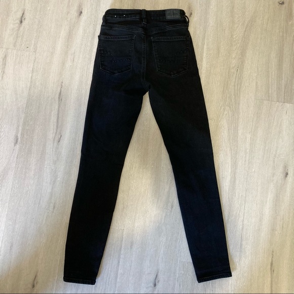 Black skinny jeans with rips at the knee - Picture 3 of 3